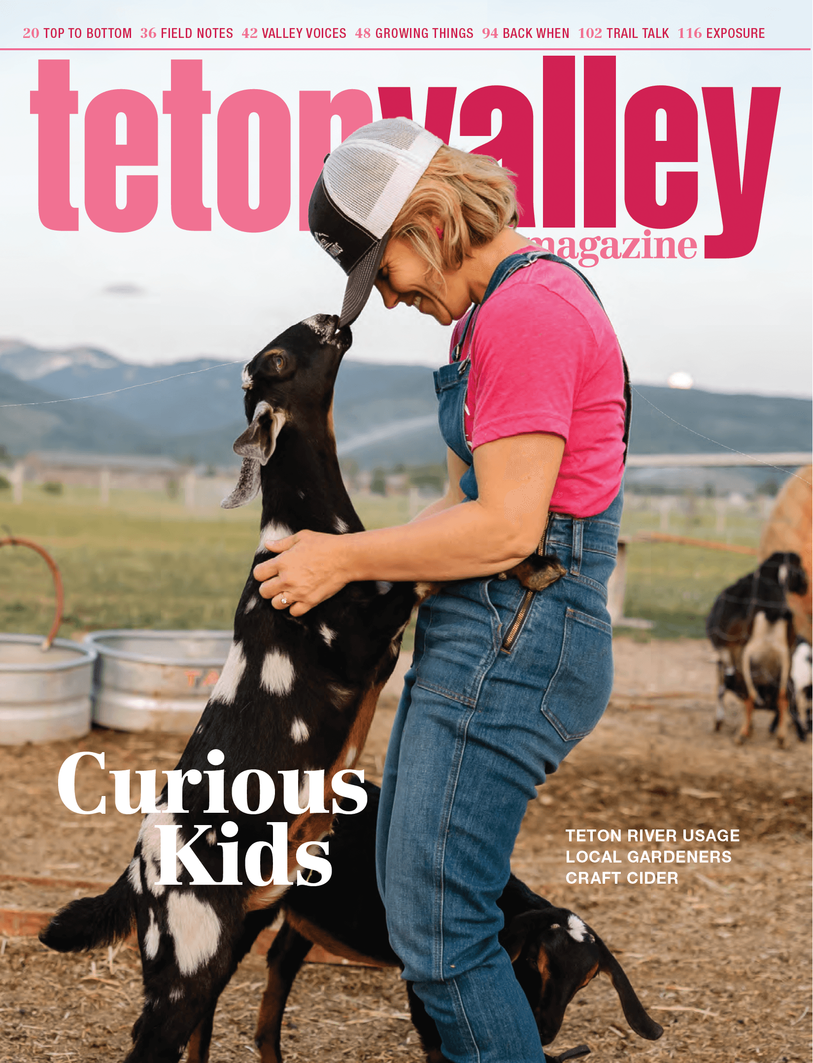 cover of summer 2022 Teton Valley Magazine with woman and goat in Driggs Idaho.